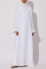 Load image into Gallery viewer, Elegant White Modest Maxi Dress with Detachable Overlay – Long Sleeve Abaya Style
